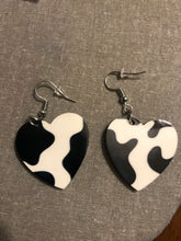 Load image into Gallery viewer, Cow Print Heart Dangle Earrings
