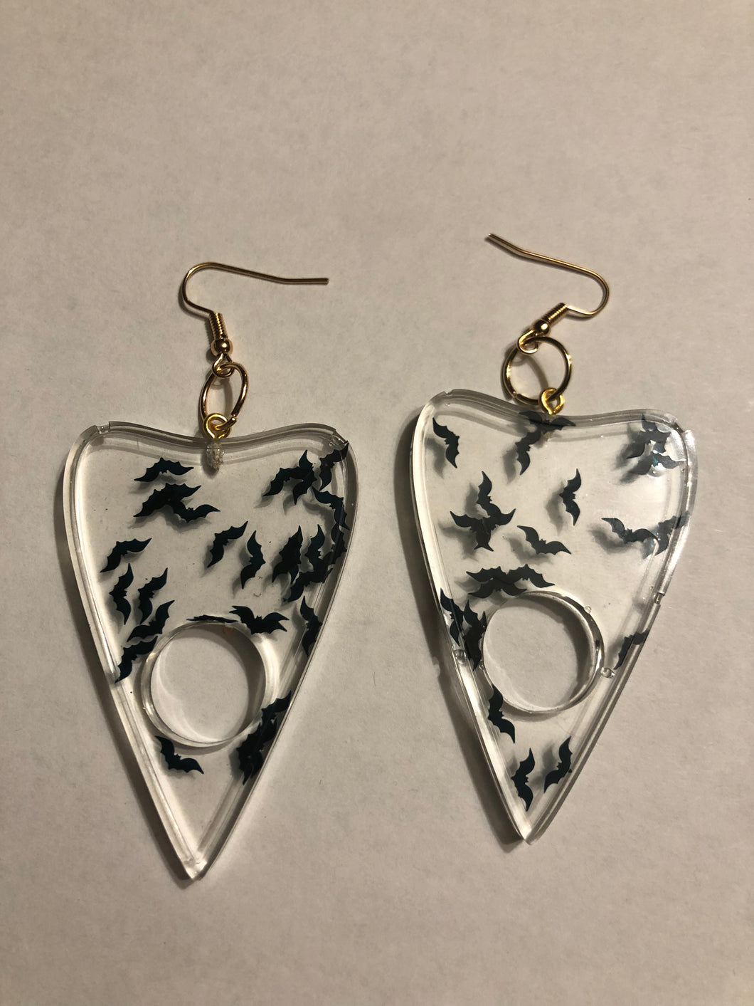 Clear Dangly Bat Planchette Earrings